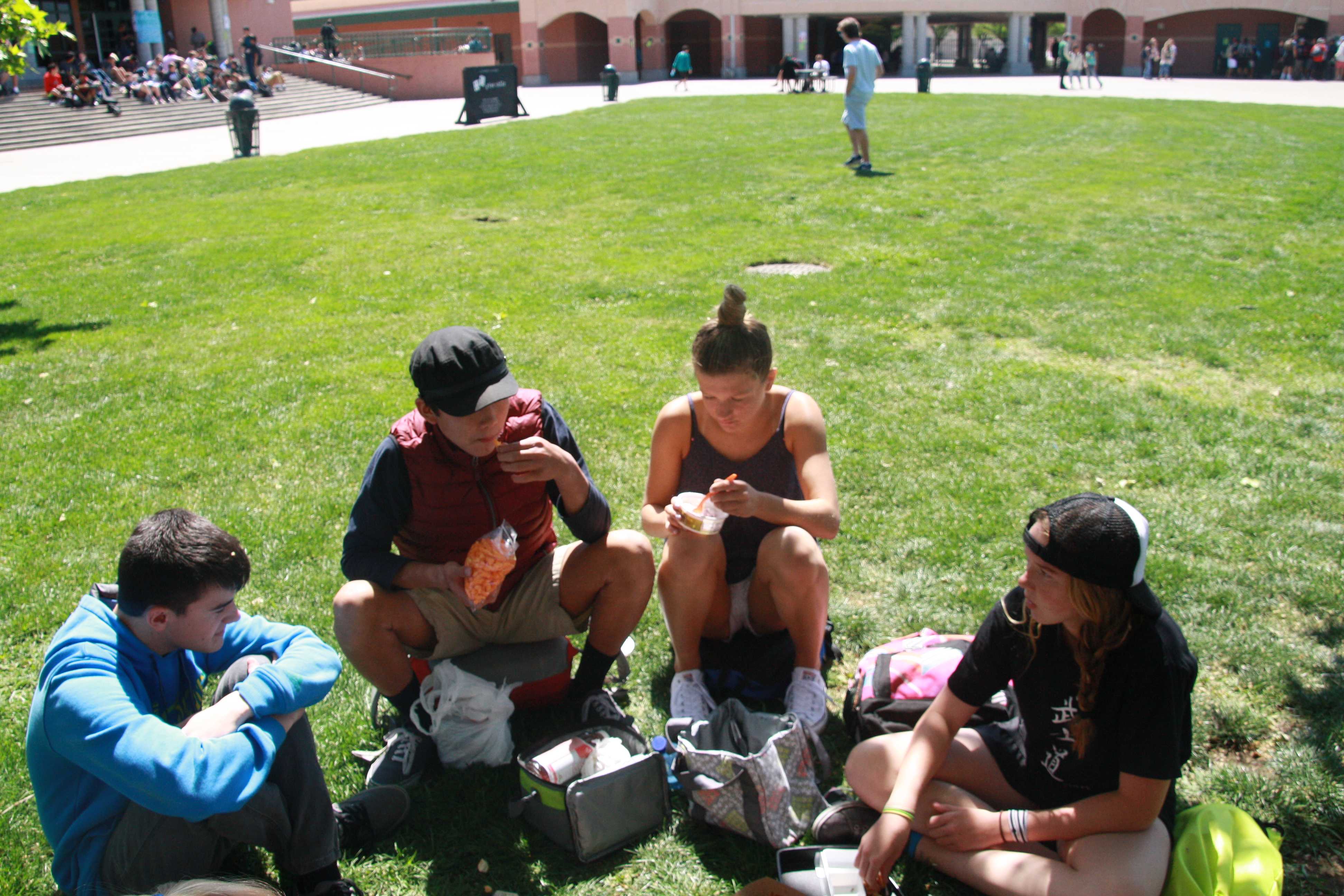 To have a good time at lunch you have to talk about random things like freshmen Mackenzie Hall is telling us a story about her putting a piece of bread on her cat to copy a trend where you put a piece of on your dog and say its a half “bread” but she couldn't use her dog so she used her cat.” I was going to use my dog but my mom said ‘no it was dog abuse’ I used my cat Instead but it was hard to use my cat she keep running away but it was really” said Hall. Photo by Dillon Wilder