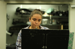 BALANCING ACTS: Although balancing band and academics is difficult, freshman Yasmine Greiss enjoys being part of a group where everyone is so accepting of one another. While reading off her music sheet, Greiss played the oboe in band during first period on April 22. “I love being able to play my oboe during school,” Greiss said. Photo by Reese Richmond