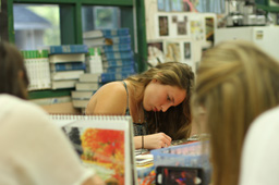 PASTEL SKY: Provided with the help of a reference, sophomore Jessica Ginniver works on making her pastel project look more realistic during first period art on April 22. Although making the piece look more realistic had been difficult for her, she enjoyed the sky in her piece. “My favorite part about my project is the sky, just because I practiced it in my sketchbook so many times to make it look like clouds, not just blobs,” Ginniver said. Photo by Reese Richmond